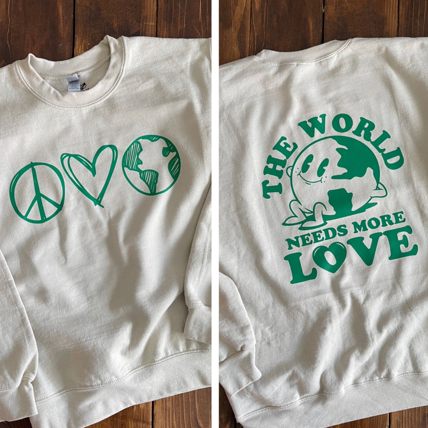 the world needs more love crewneck