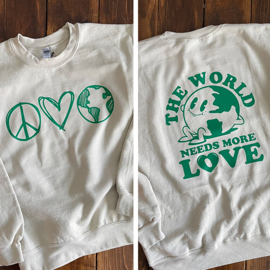 the world needs more love crewneck