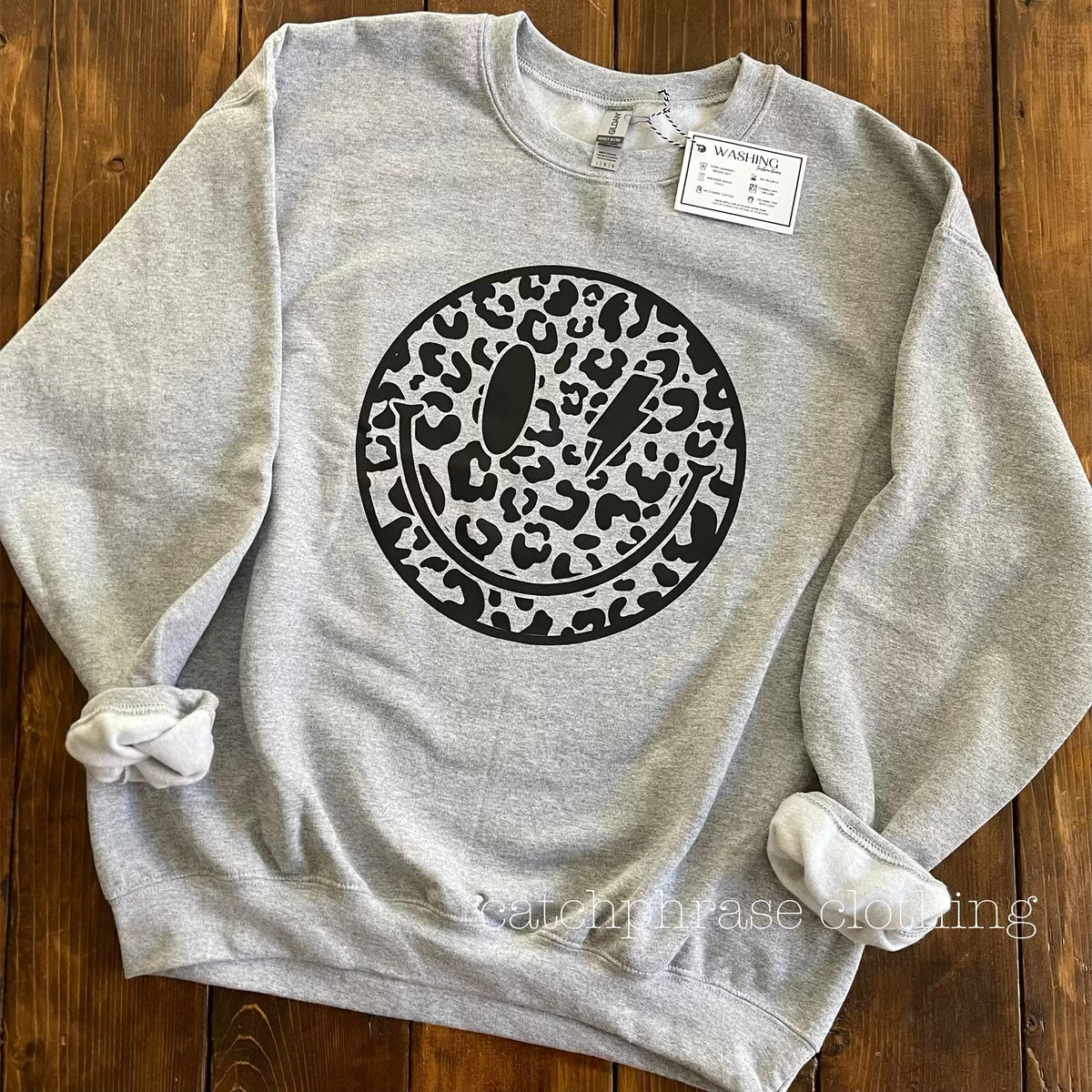 cheetah smiley crewneck